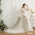 Classically designed white lace wedding dress with V-neck and floor-length mermaid dress wedding dress accessories